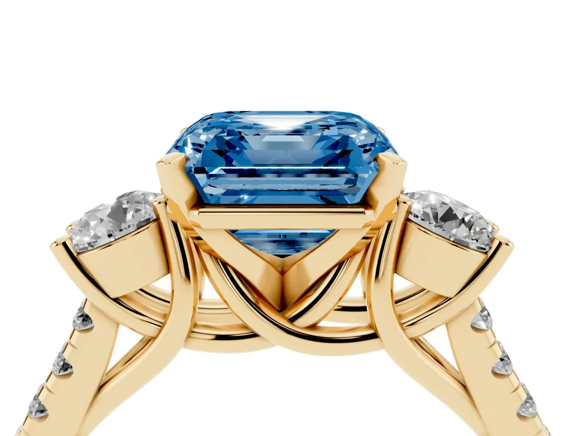 Fancy Blue Three-Stone Asscher Cut Diamond Pavé Band with Four-Prong Setting Yellow gold