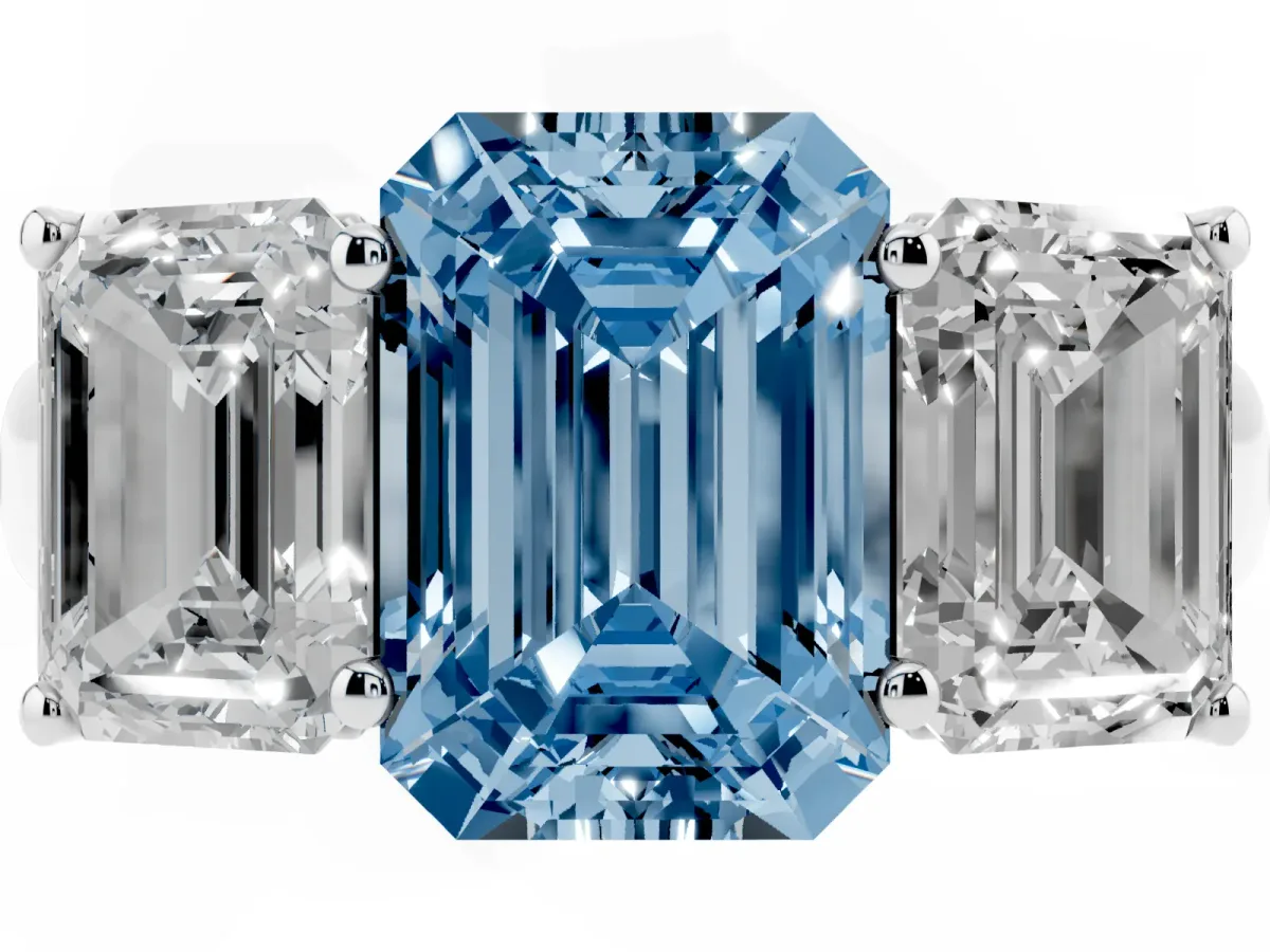 Fancy Blue Emerald Cut Three-Stone Diamond Ring with Prong Setting on a Classic Band Silver