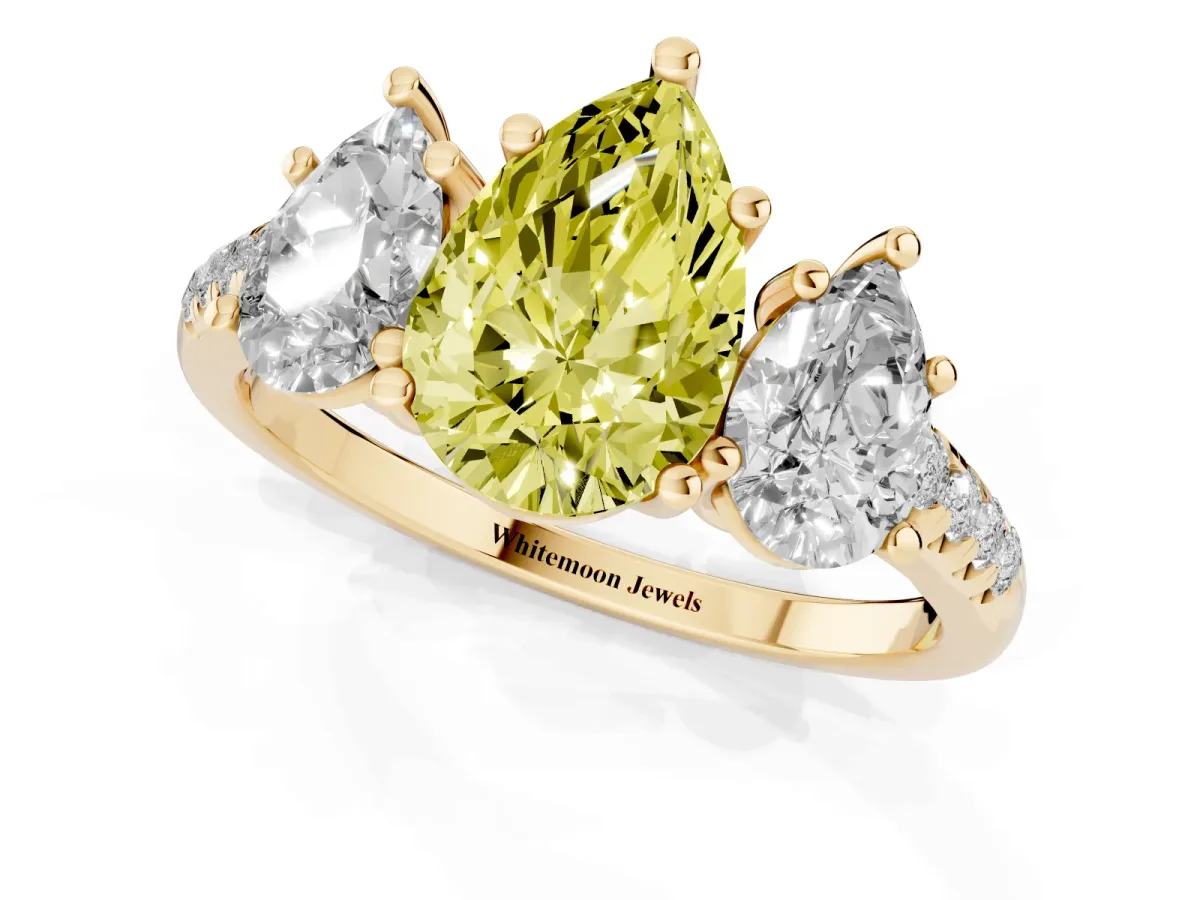 Fancy Yellow Three-Stone Pear Cut Diamond Ring with Round Pavé Band and Prong Setting Yellow gold