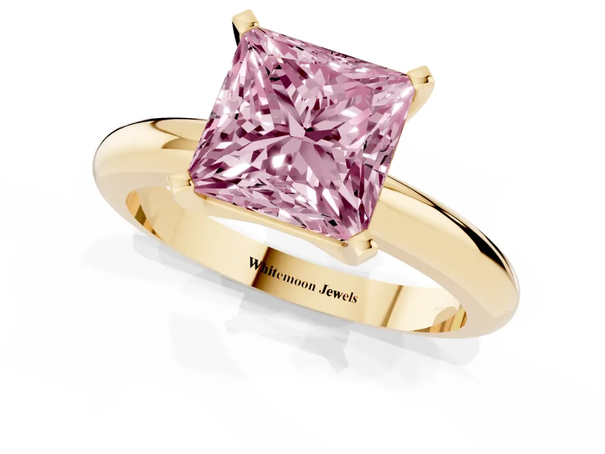 Fancy Pink Princess Cut Diamond Solitaire Engagement Ring with Round Band and Four-Prong Setting Yellow gold