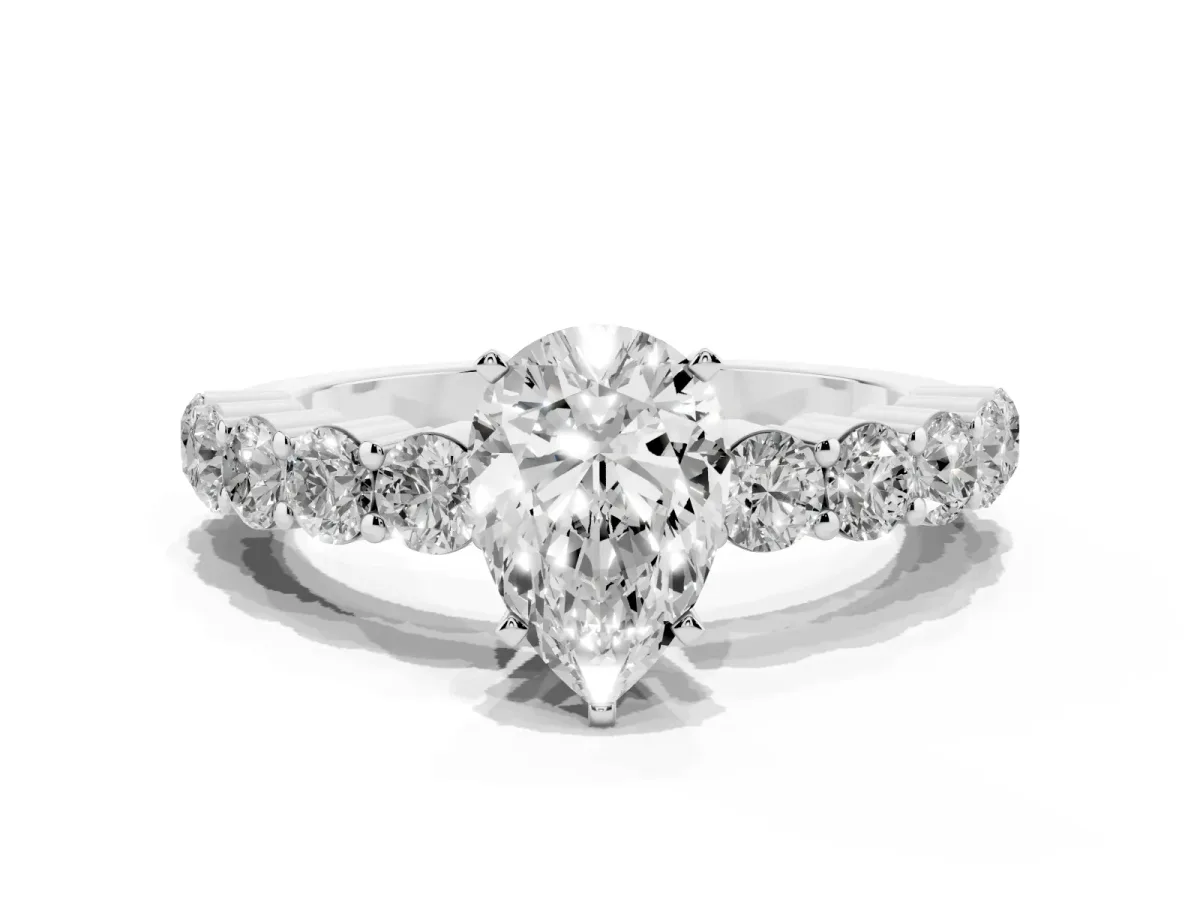 Pear Cut Diamond Solitaire Ring with Shared Prong Round Side Stones White gold