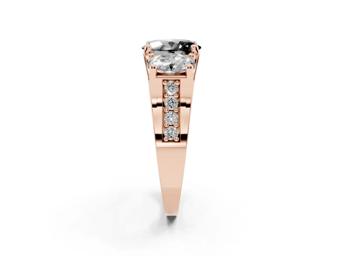 Fancy Black Oval Cut Diamond Three-Stone Ring with Channel Set Band and Four-Prong Setting Rose gold