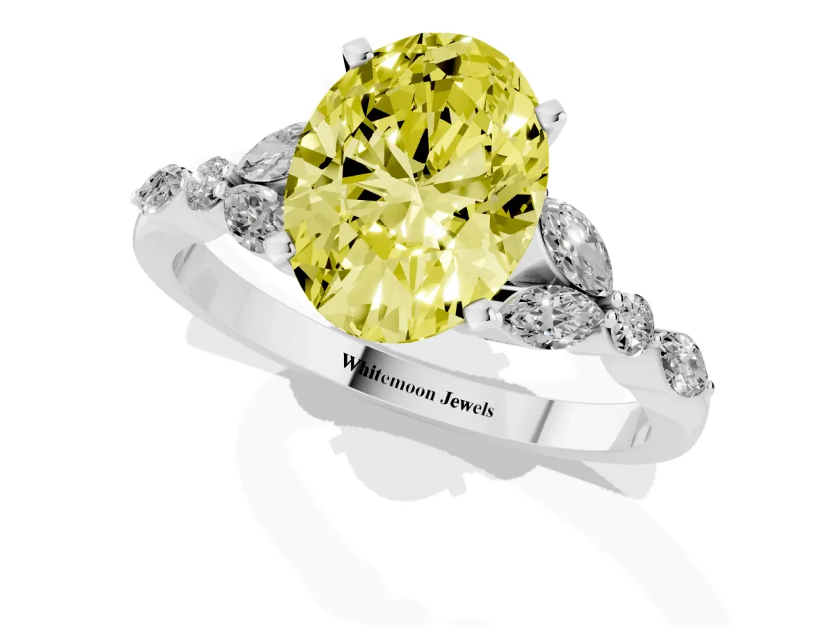Fancy Yellow Oval Cut Diamond Solitaire Ring with Side Stones and Four-Prong Setting Silver