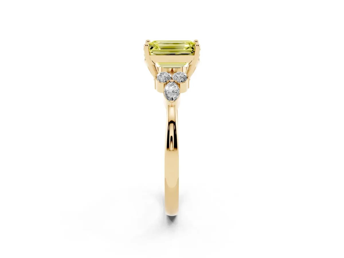 Fancy Yellow Emerald Cut Brilliant Diamond Solitaire Ring with Pear Side Stones and Four-Prong Setting Yellow gold