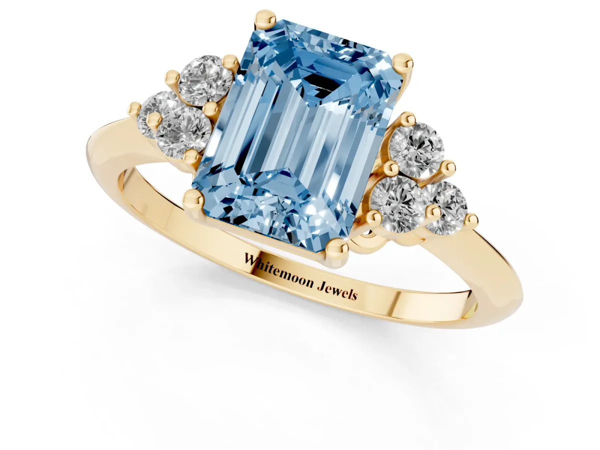 Fancy Blue Emerald Cut Cut Diamond Cluster Ring with Solitaire Band and Four-Prong Setting Yellow gold