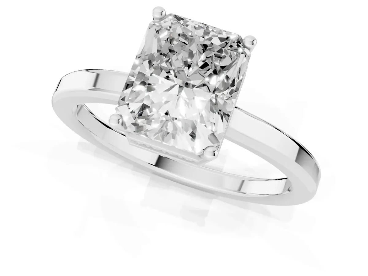 Radiant Cut Cut Solitaire Engagement Ring with Four-Prong Setting on a Classic Band Silver