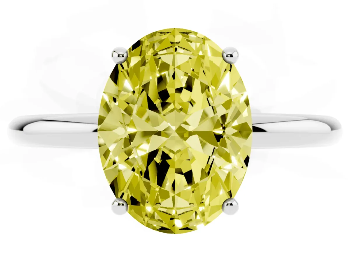 Fancy Yellow Oval Cut Solitaire Diamond Ring with a Classic Band and Four-Prong Setting Silver