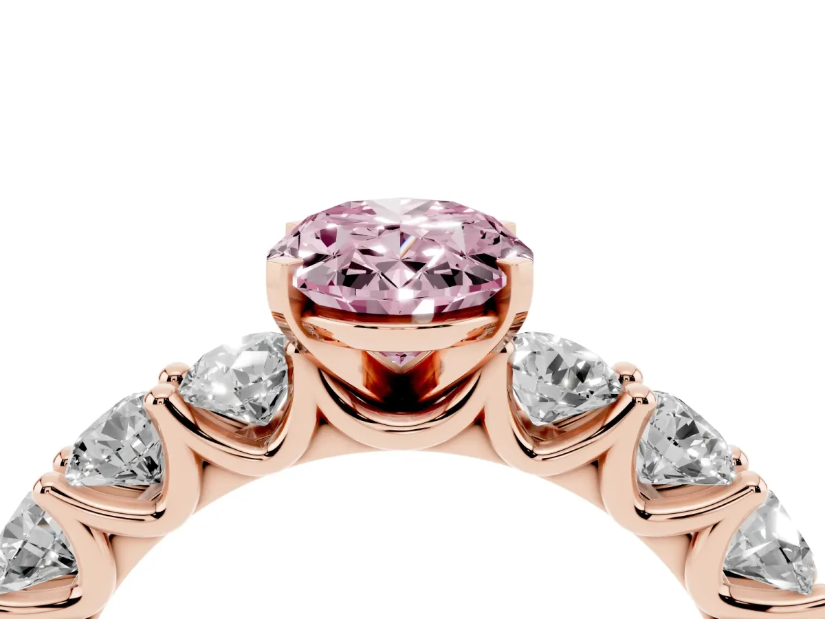 Fancy Pink Oval Cut Diamond Prong Setting with Side Stones on a Pave Band Rose gold