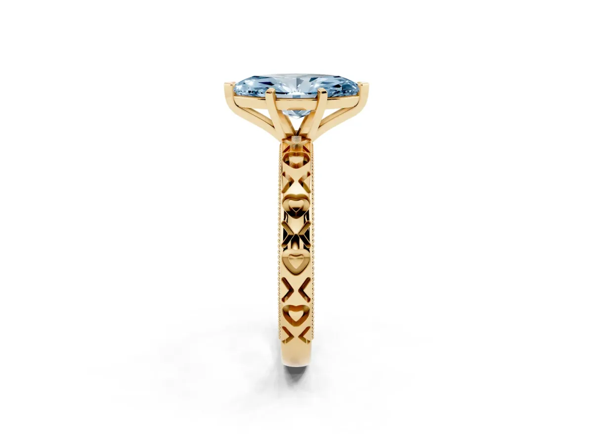 Fancy Blue Marquise Cut Solitaire Diamond Engagement Ring with XO Engraved Band and Four-Prong Setting Yellow gold