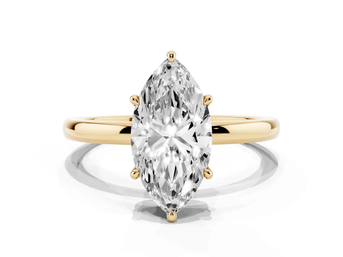 Marquise Cut Solitaire Engagement Ring with Cathedral Band and Four-Prong Setting Yellow gold