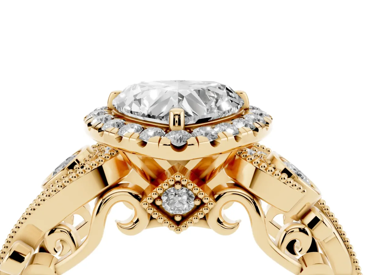 Heart Cut Halo Diamond Ring with Milgrain and Bezel Accents on a Split Shank Band Yellow gold