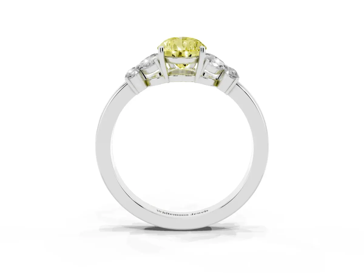 Fancy Yellow Pear Cut Cut Solitaire Floral Diamond Ring with Four-Prong Setting Platinum