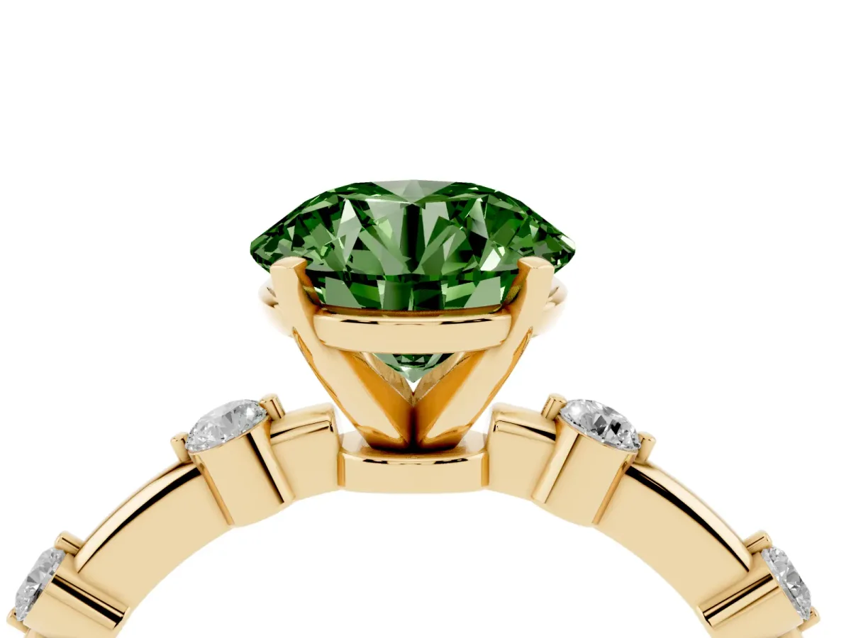 Fancy Green Round Cut Solitaire Diamond Ring with Bezel Set Side Stones and Prong Setting Yellow gold