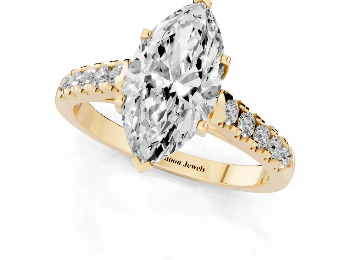 Marquise Cut Diamond Pavé Band Solitaire Ring with Prong Setting Yellow gold