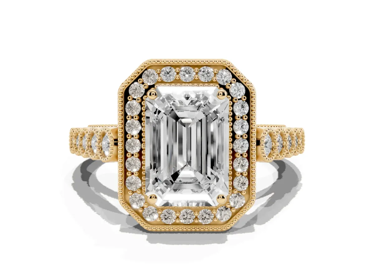 Emerald Cut Halo Milgrain Solitaire with Bezel Set Side Stones and Pave Band Yellow gold
