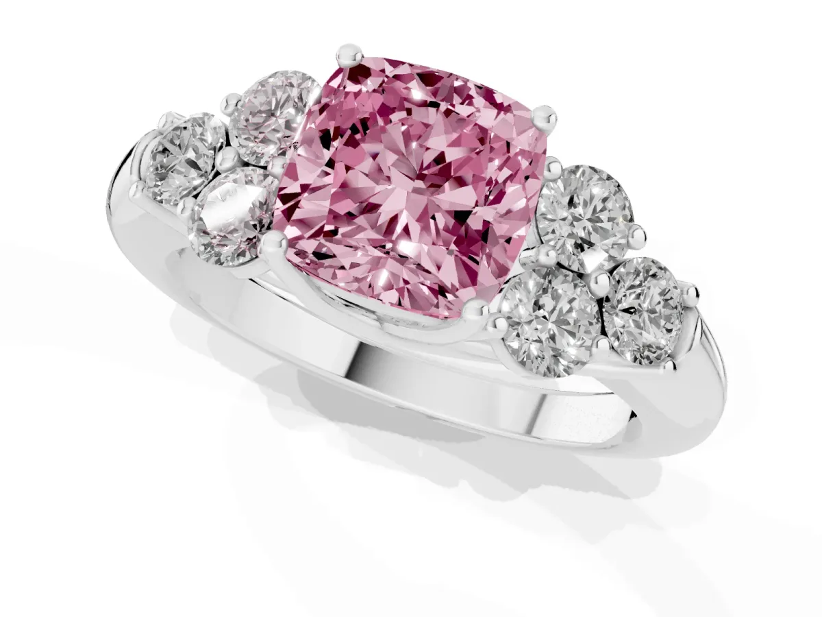 Fancy Pink Cushion Cut Cut Diamond Cluster Ring with Round Accent Stones and Prong Setting on a Classic Band Platinum