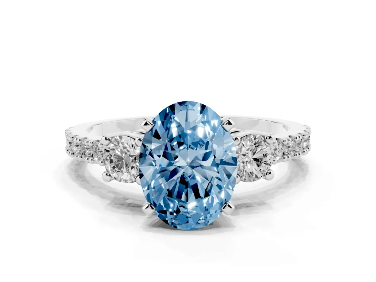 Fancy Blue Oval Cut Three-Stone Diamond Pavé Band with Prong Setting Silver