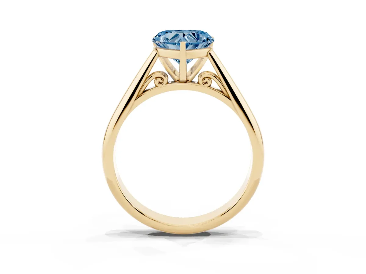 Fancy Blue Heart Cut Diamond Solitaire Engagement Ring with Cathedral Setting and Four-Prong Mount Yellow gold