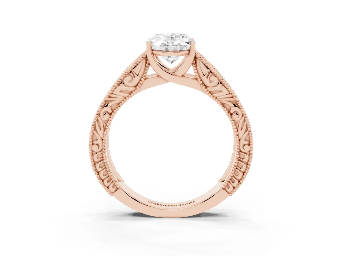 Oval Cut Diamond Solitaire Ring with Engraved Band and Four-Prong Setting Rose gold