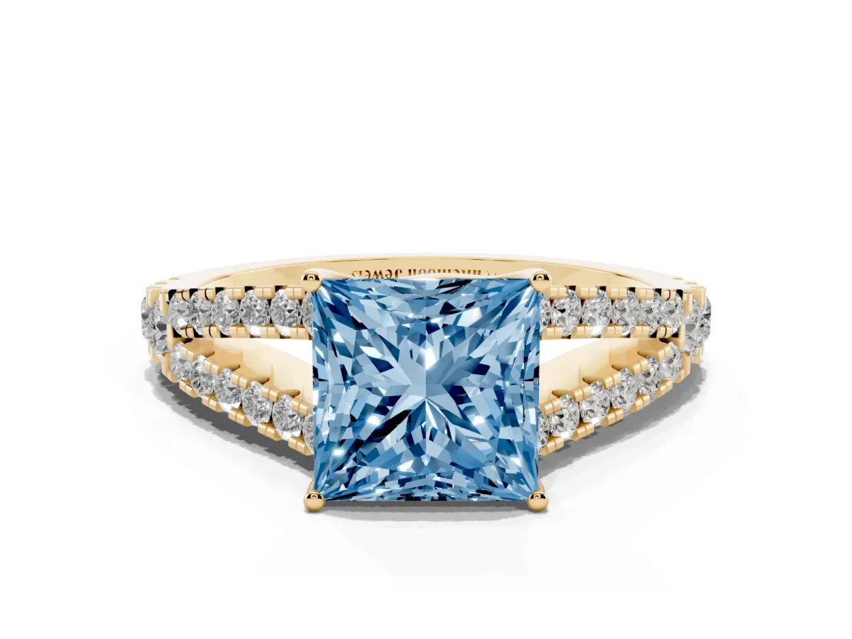 Fancy Blue Princess Cut Diamond Split Shank Engagement Ring with Round Pavé and Prong Setting Yellow gold