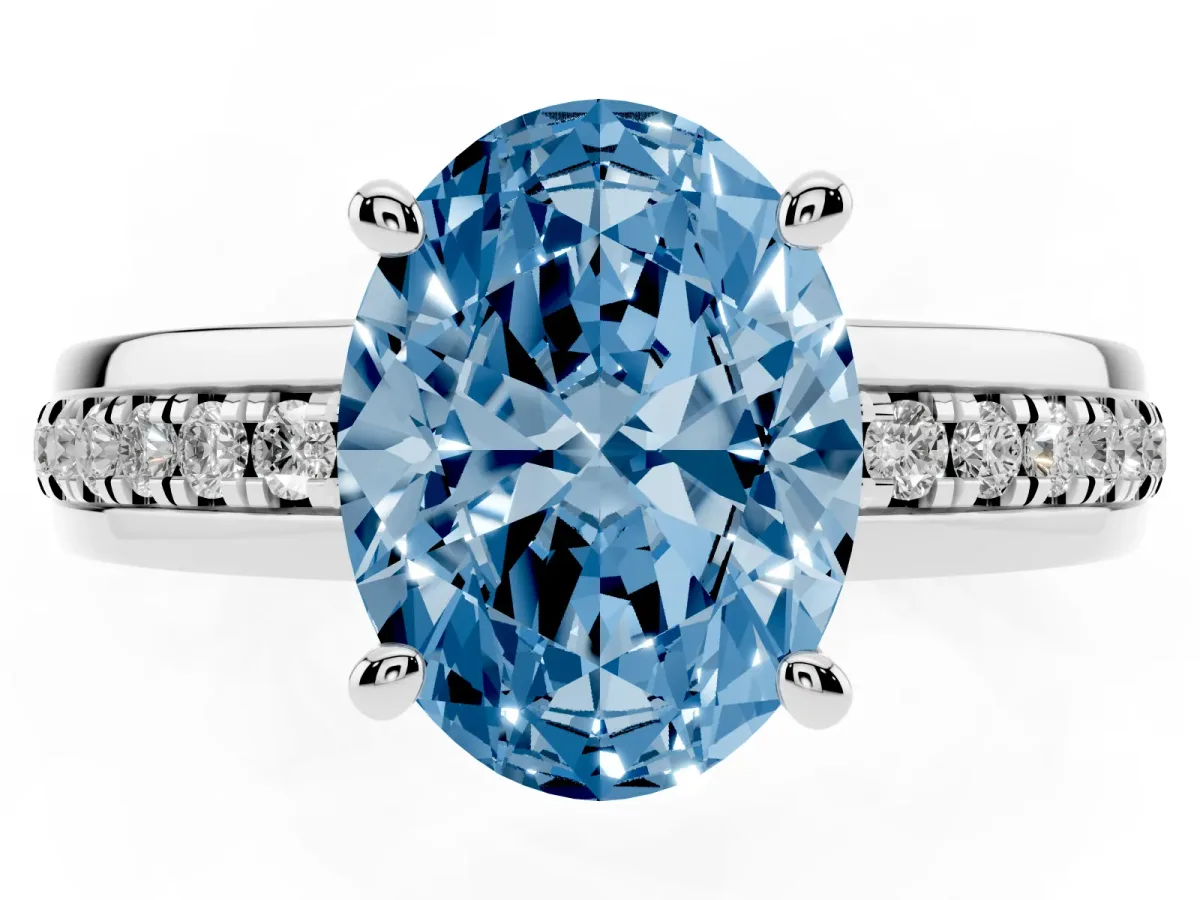 Fancy Blue Oval Cut Solitaire Diamond Ring with Channel Set Band and Six-Prong Setting Silver