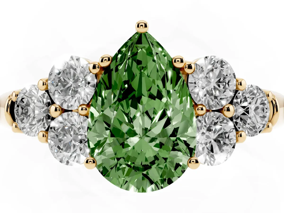 Fancy Green Pear Cut Cut Diamond Cluster Ring with Round Accent Stones and Prong Setting on a Classic Band Yellow gold