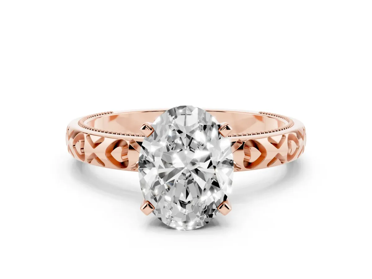 Oval Cut Solitaire Diamond Engagement Ring with XO Engraved Band and Four-Prong Setting Rose gold