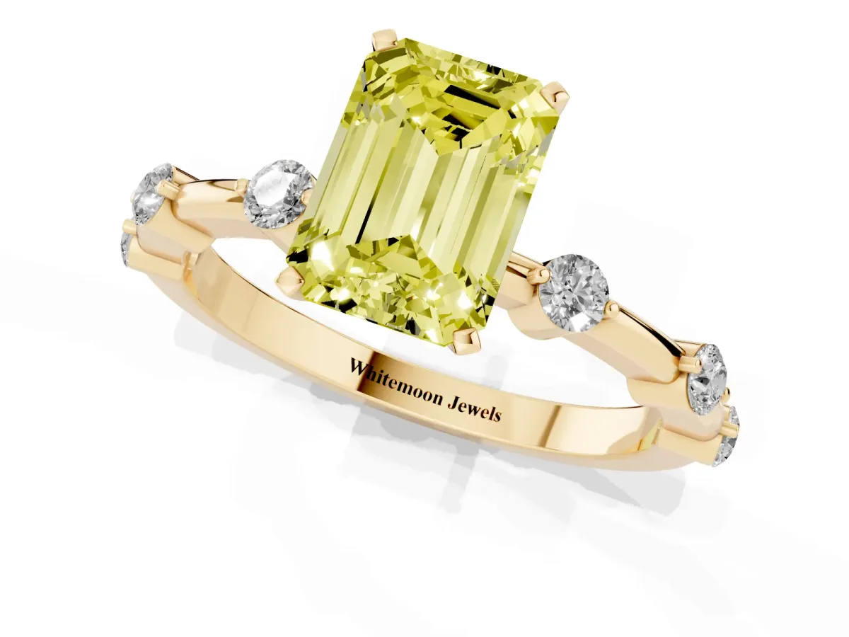 Fancy Yellow Emerald Cut Solitaire Diamond Ring with Bezel Set Side Stones and Prong Setting Yellow gold