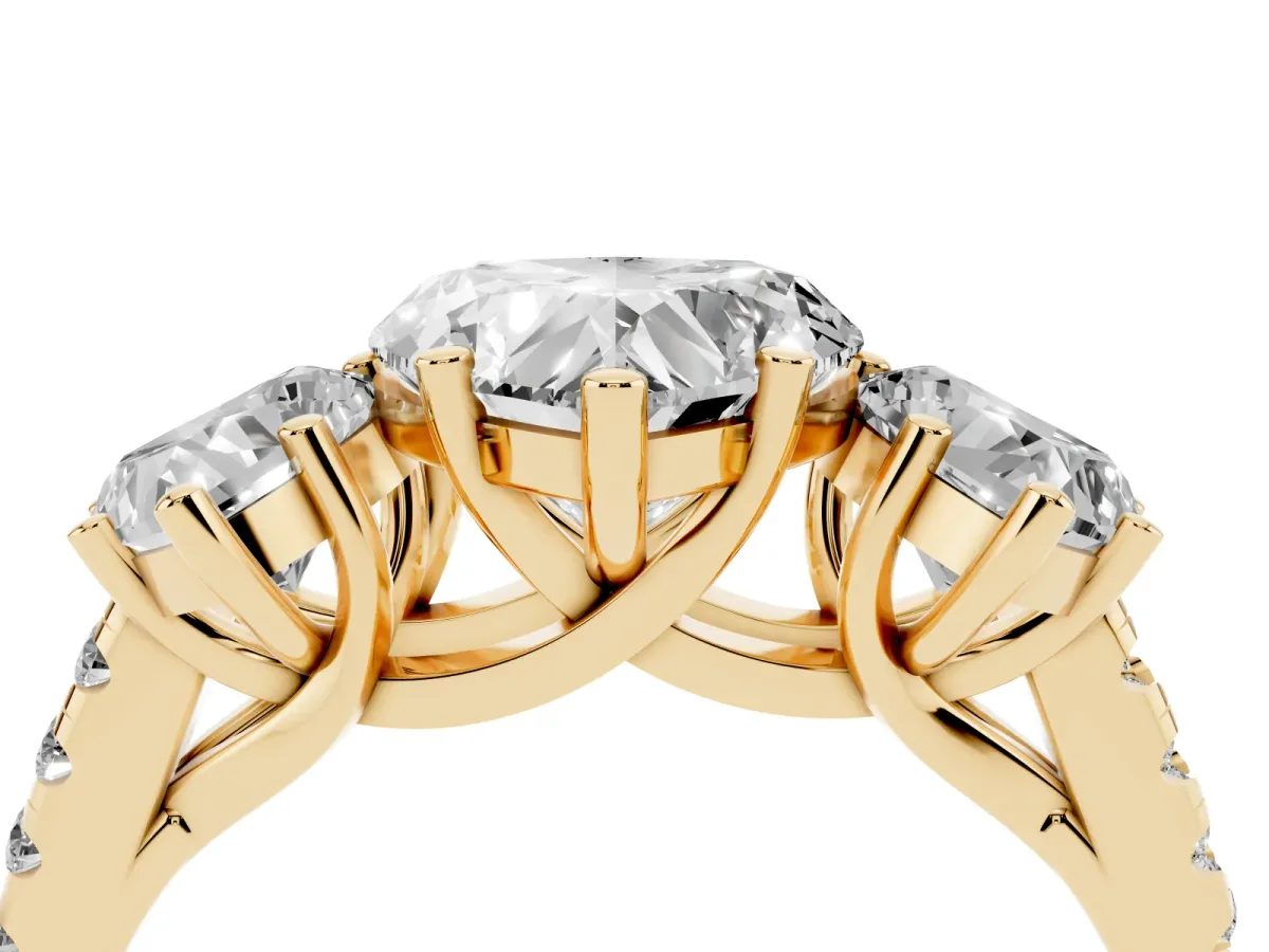 Three-Stone Heart Cut Diamond Ring with Round Pavé Band and Prong Setting Yellow gold