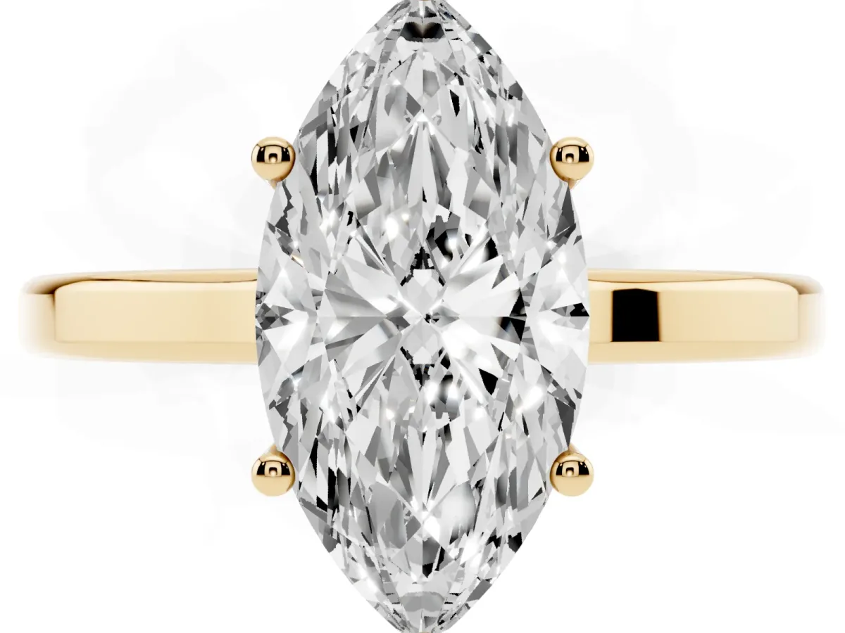 Marquise Cut Cut Solitaire Engagement Ring with Four-Prong Setting on a Classic Band Yellow gold