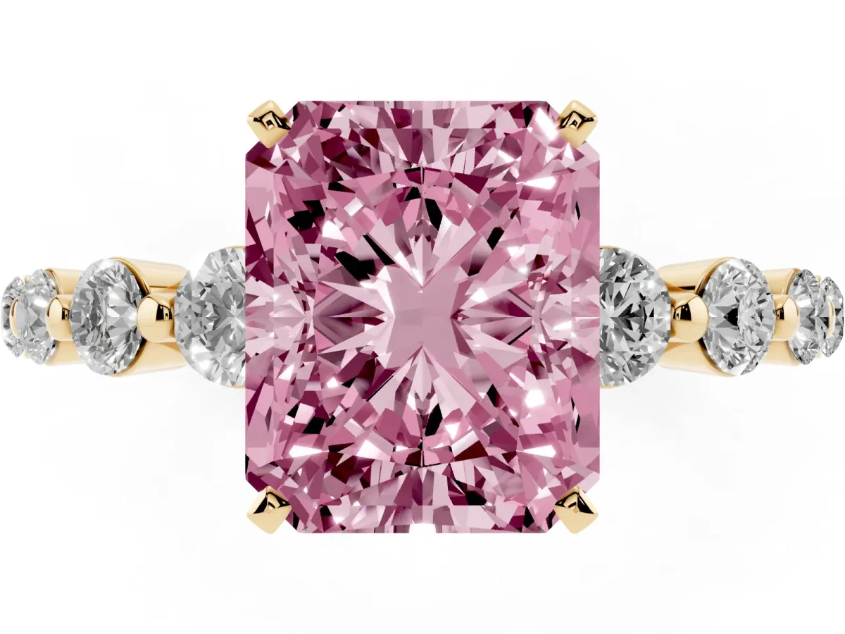 Fancy Pink Radiant Cut Solitaire Diamond Ring with Pave Band and Four-Prong Setting Yellow gold