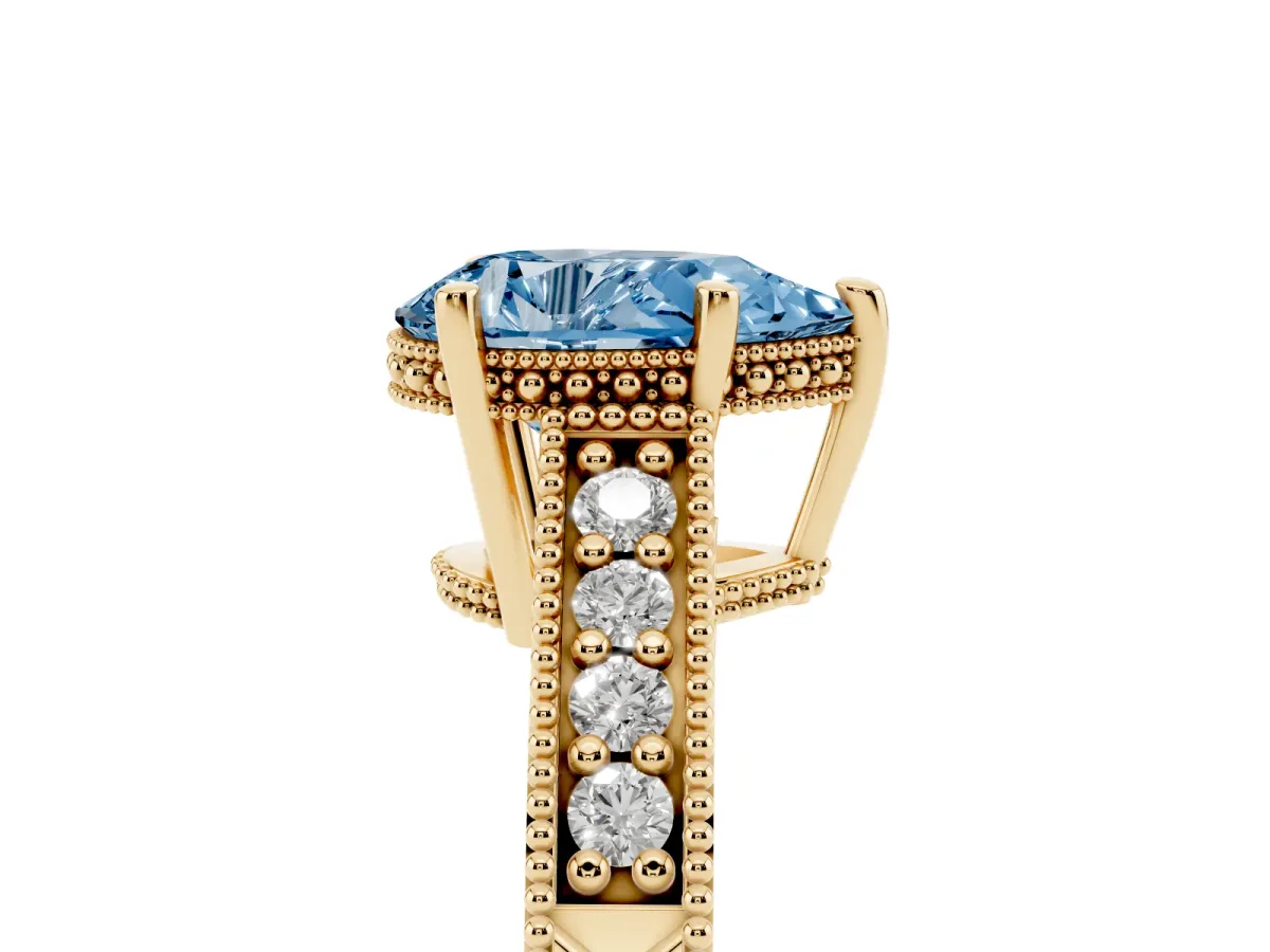 Fancy Blue Pear Cut Solitaire Pavé Diamond Milgrain Engagement Ring with Four-Prong Setting Yellow gold