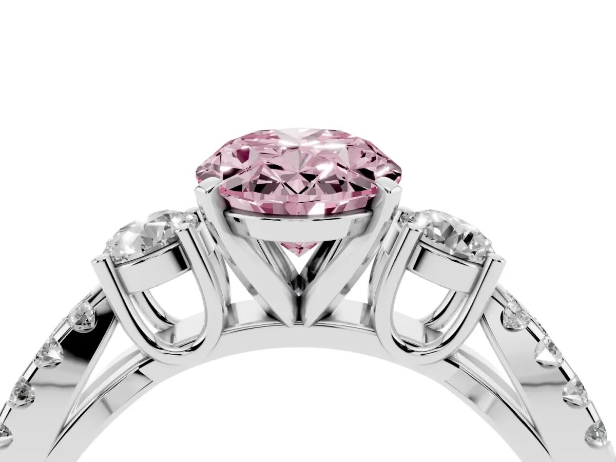 Fancy Pink Oval Cut Diamond Three-Stone Ring with Pavé Split Shank and Four-Prong Setting Silver