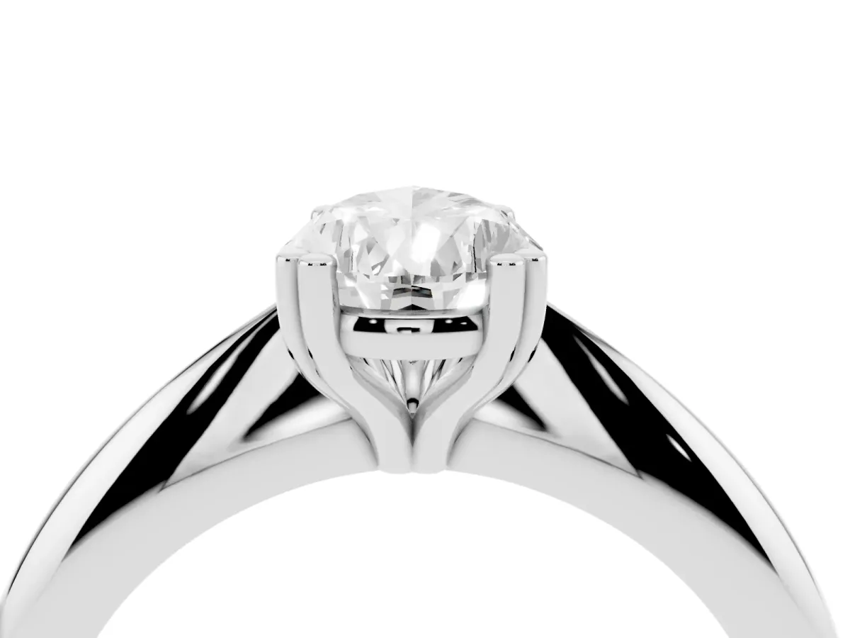 Pear Cut Cut Solitaire Engagement Ring with Tapered Band and Four-Prong Setting Platinum