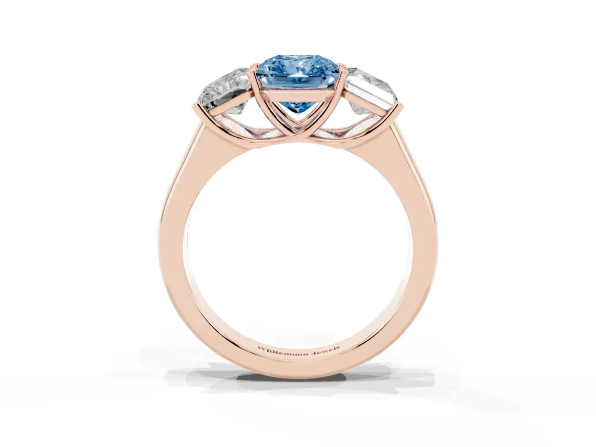 Fancy Blue Radiant Cut Three-Stone Diamond Ring with Prong Setting on a Classic Band Rose gold