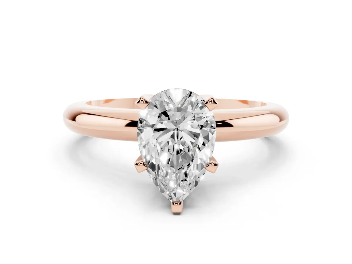 Pear Cut Diamond Solitaire Engagement Ring with Round Band and Four-Prong Setting Rose gold