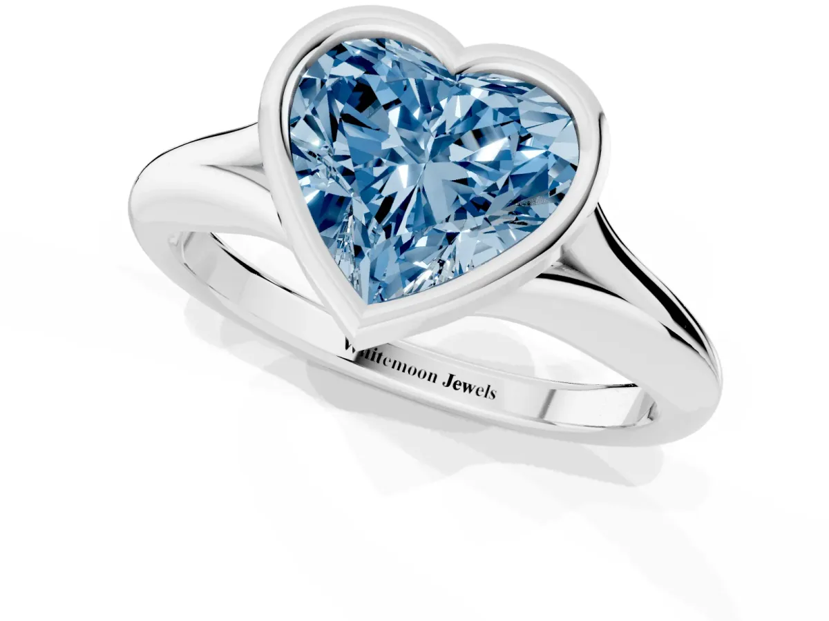 Fancy Blue Bezel Set Heart Cut Solitaire Diamond Ring with Smooth Band Platinum