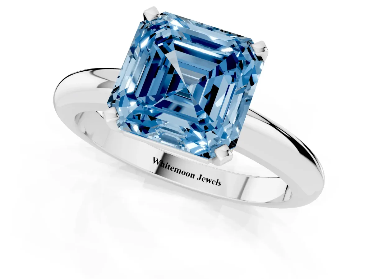 Fancy Blue Asscher Cut Diamond Solitaire Engagement Ring with Round Band and Four-Prong Setting Silver