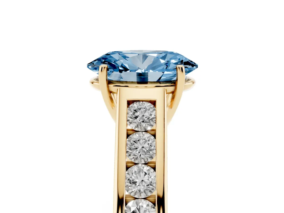 Fancy Blue Oval Cut Solitaire Channel-Set Diamond Engagement Ring with Four-Prong Setting Yellow gold