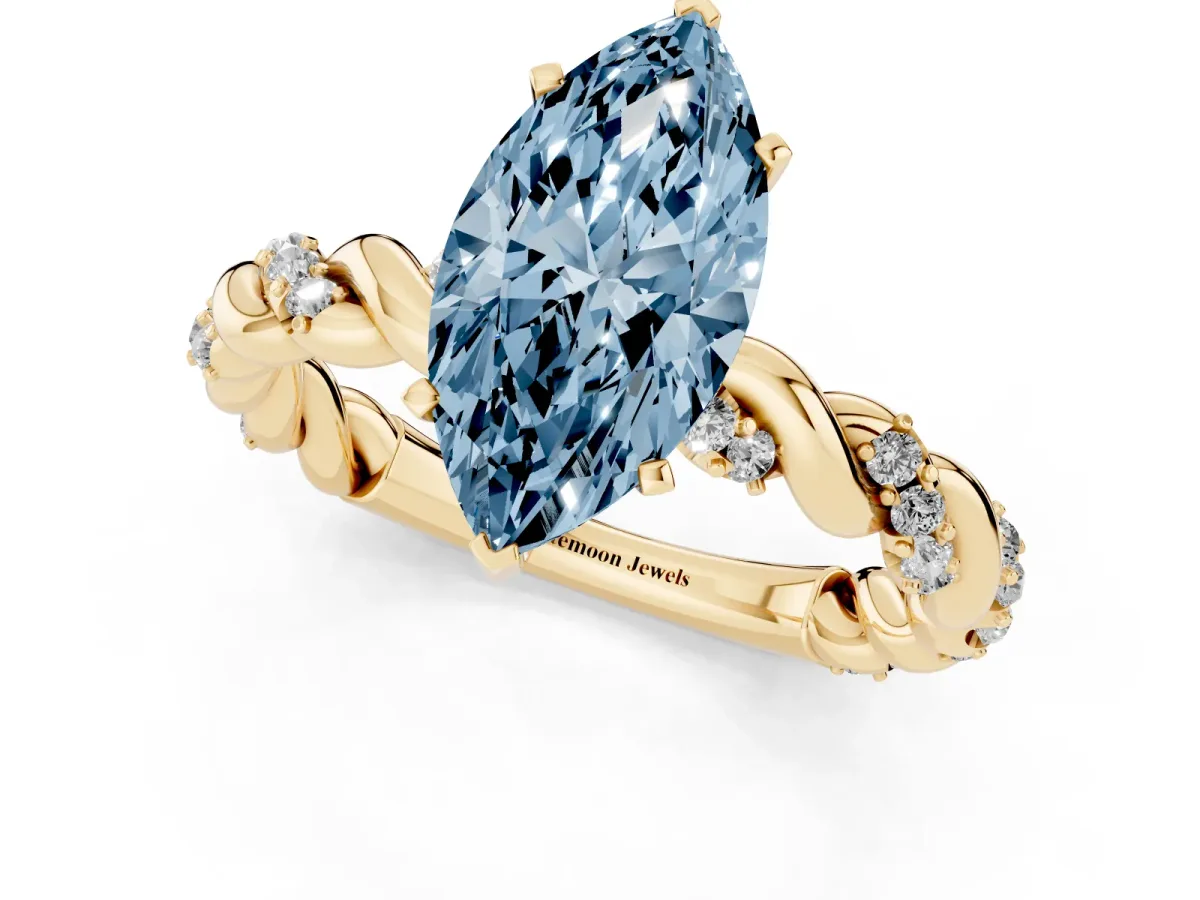 Fancy Blue Marquise Cut Diamond Solitaire Ring with Twisted Band and Pavé Accents Yellow gold