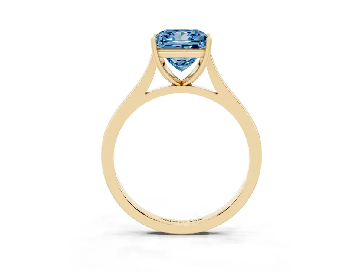 Fancy Blue Princess Cut Solitaire Heart Prong Engagement Ring with Tapered Band Yellow gold