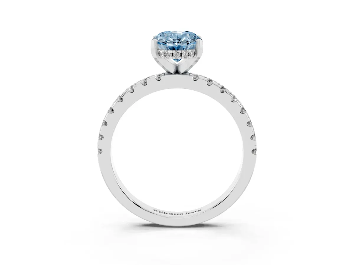 Fancy Blue Oval Cut Diamond Solitaire Ring with Round Pavé Band and Four-Prong Setting Silver