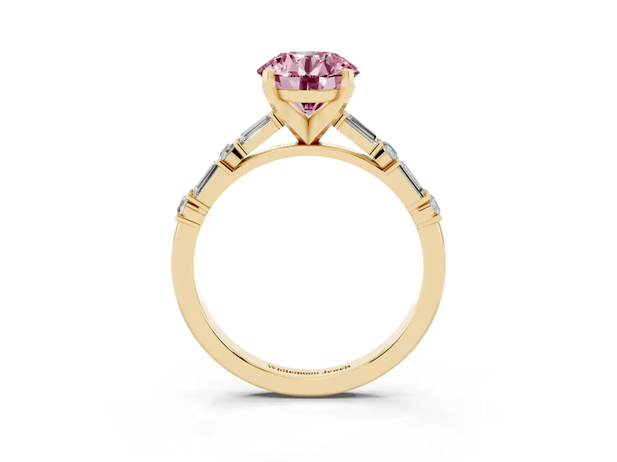 Fancy Pink Round Cut Diamond Solitaire with Side Baguettes and Channel Set Band Yellow gold