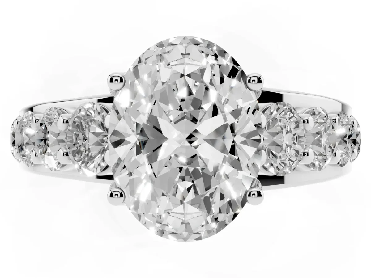 Oval Cut Diamond Engagement Ring with Pavé Band and Four-Prong Setting Platinum