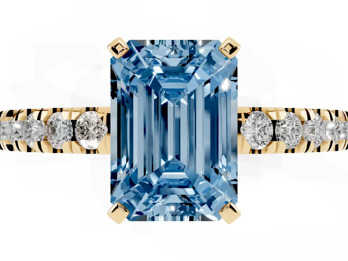 Fancy Blue Emerald Cut Solitaire Diamond with Pavé Band and Four-Prong Setting Yellow gold