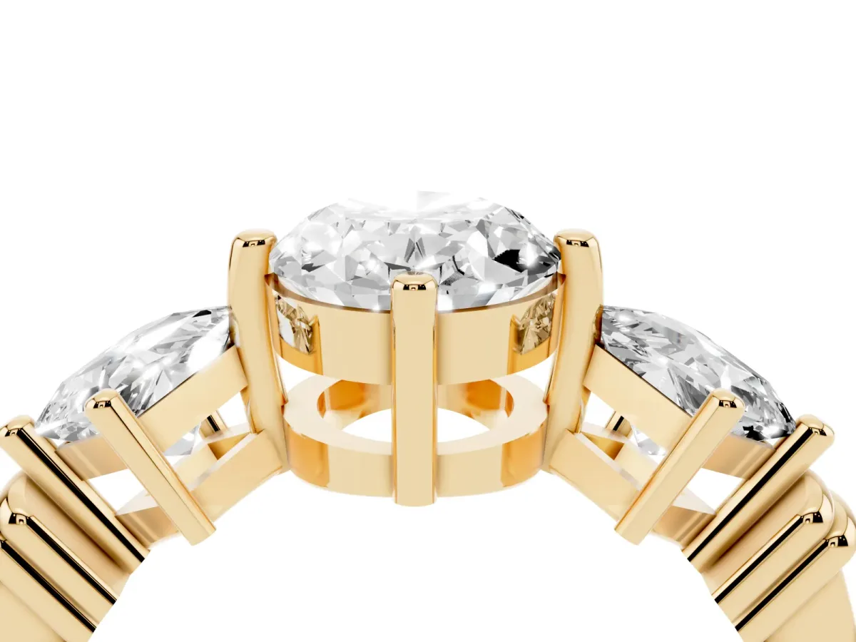 Three-Stone Oval Cut and Princess Cut Diamond Ring with Channel Band and Four-Prong Setting Yellow gold