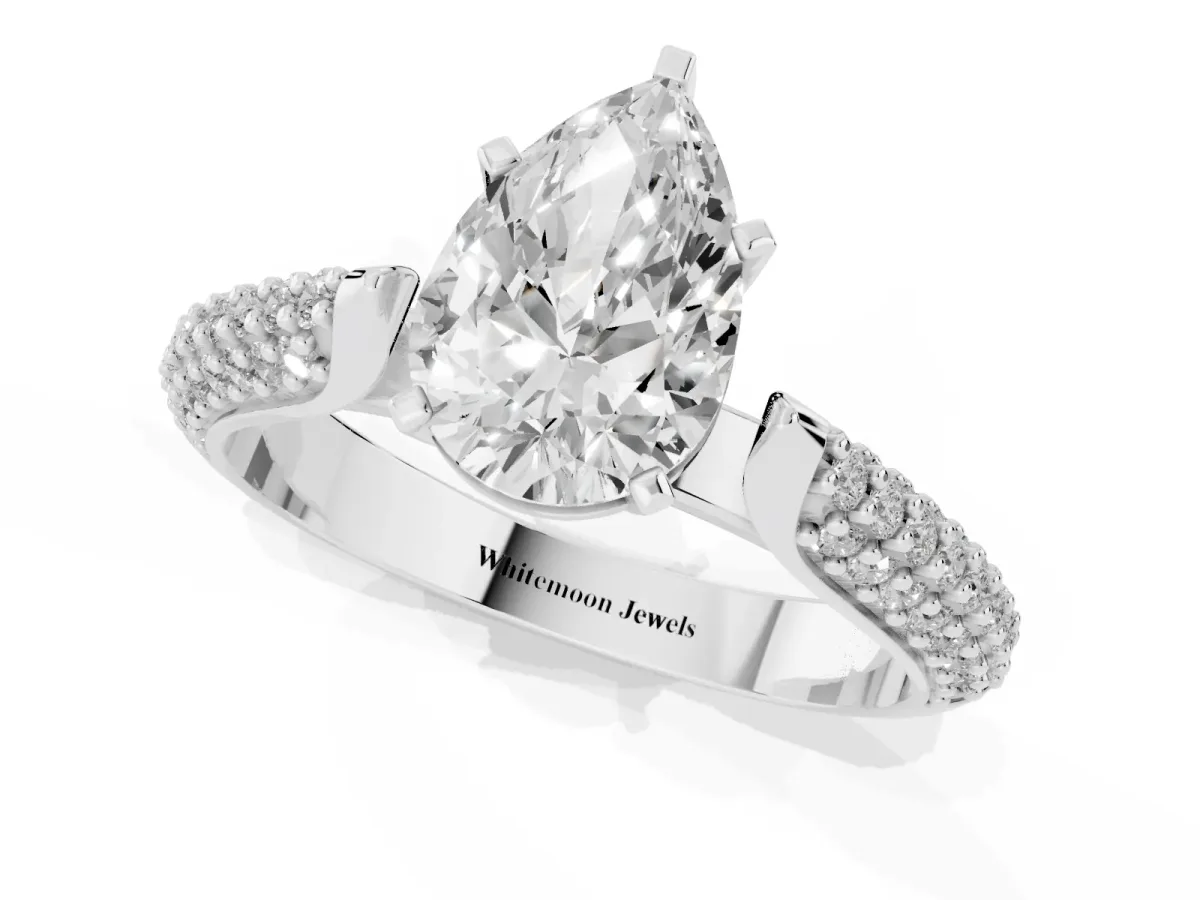 Pear Cut Diamond Solitaire Engagement Ring with Multi-Row Round Pavé Band and Prong Setting Platinum