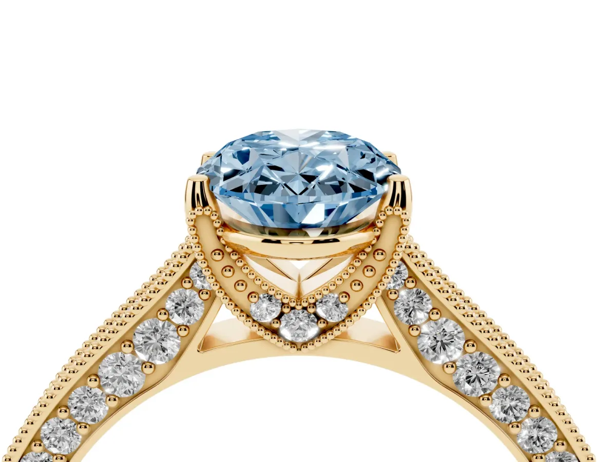 Fancy Blue Oval Cut Cut Diamond Solitaire Ring with Milgrain Pave Band and Four Prong Setting Yellow gold