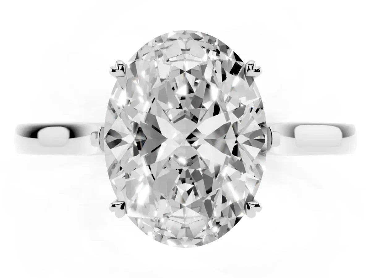 Oval Cut Solitaire Heart Prong Engagement Ring with Tapered Band White gold