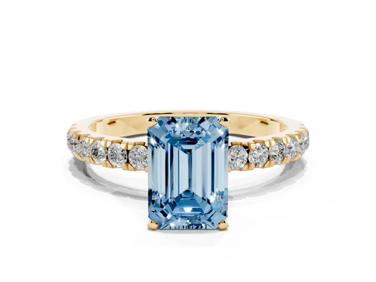 Fancy Blue Emerald Cut Diamond Solitaire Ring with Pavé Accents and Four-Prong Setting Yellow gold